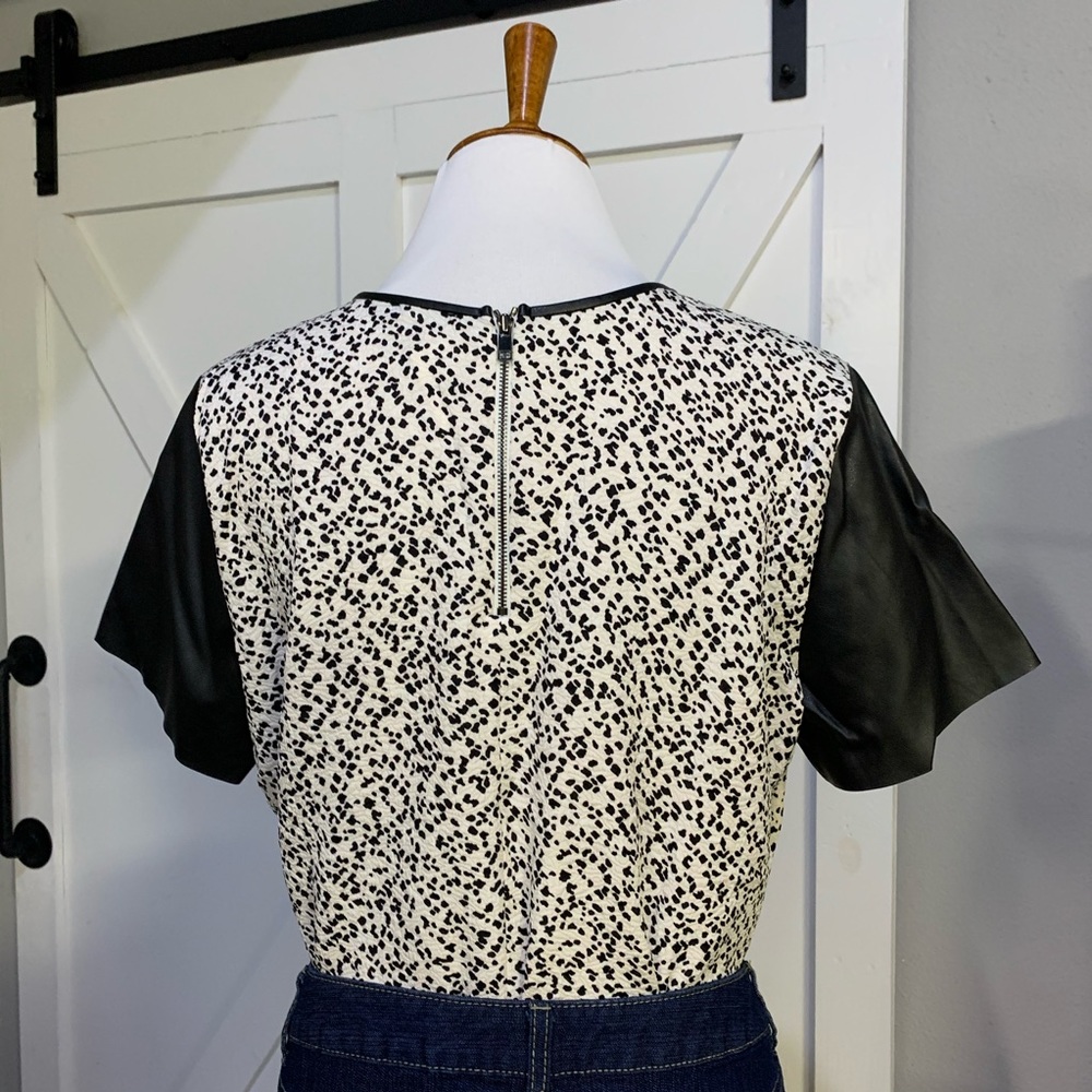 Black and white spotted top